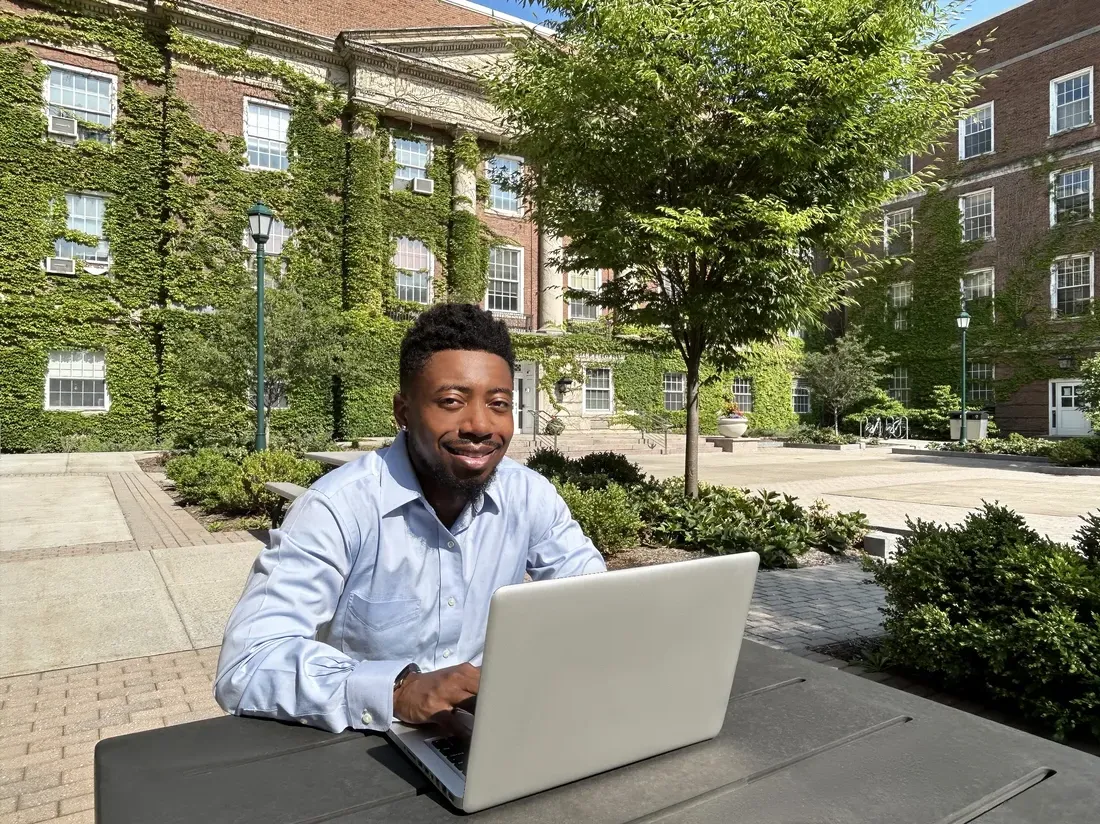 Aarick Knighton working on computer.